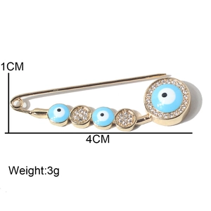 Fashion gold alloy waist pin with blue evil eye charms and sparkling rhinestones