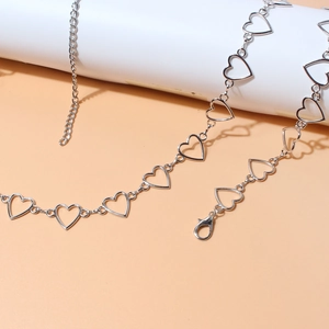 Silver hollow heart-shaped chain belt with lobster clasp and adjustable link chain