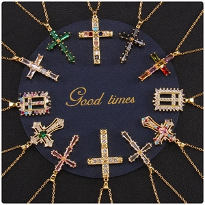 Collection of colorful zircon cross necklaces in diverse gold and silver plated designs