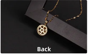 Macro view of the back of the golden clover spinning necklace pendant with hollow structure