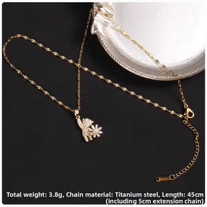 Macro view of titanium steel bear pendant with cubic zirconia and S-Steel tag
