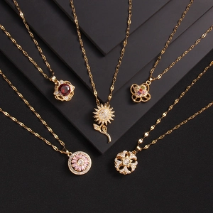 Elegant gold necklaces set with rotating clover, sunflower and zircon heart bear pendants