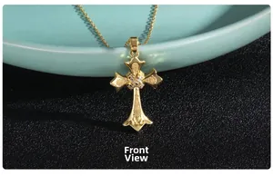 Front view of a gold cross pendant necklace featuring colorful zircon stones and matte texture