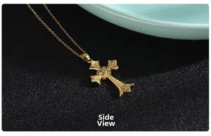 Side view of gold plated cross necklace with micro-pave cubic zirconia crystals