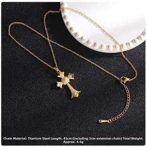 Detail of 45cm titanium steel gold cross necklace with micro-pave cubic zirconia