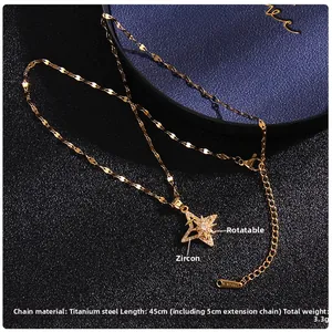 Detailed view of rotating star pendant necklace with cubic zirconia and 45cm steel chain