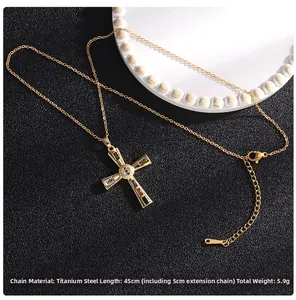 Detail of colorful zircon cross pendant with titanium steel chain and lobster clasp