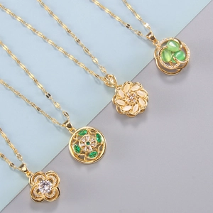 Set mit rotierenden Goldketten, Zirkonia, grünen Steinen und Katzenaugen-Anhängern