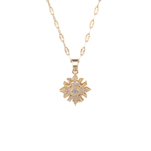Elegant gold-plated sunflower pendant necklace with white zircons on a white background