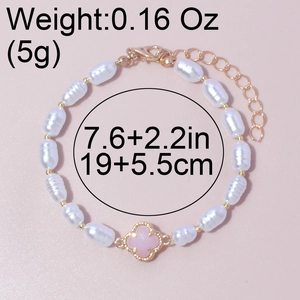 Bracciale di perle vintage con ciondolo a quadrifoglio rosa e dettagli dorati