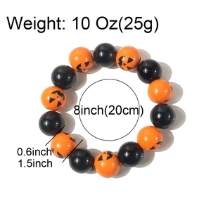 Halloween pumpkin bead bracelet with orange and black beads, 8 inches long
