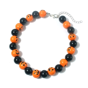 Beaded Halloween necklace with orange Jack-o'-lantern pumpkins and black beads