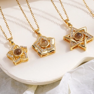 Gold plated necklaces with star and flower pendants featuring micro projection stones