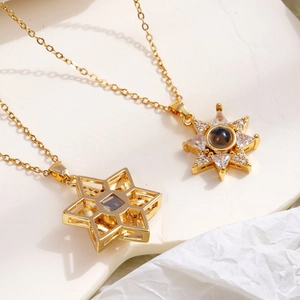 Golden star pendant necklace with cubic zirconia and 100 languages projection stone