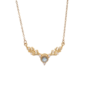 Golden reindeer antler necklace featuring a translucent moonstone pendant and zircons