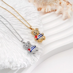 Gold and silver teddy bear pendants with full zircons and heart details on link chains