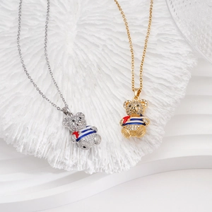 Gold and silver teddy bear pendant necklaces with cubic zirconia and striped sailor suits