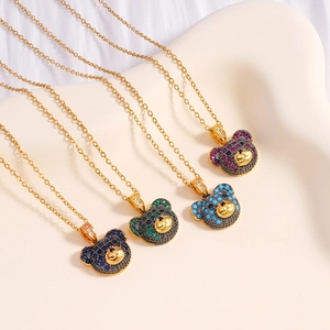 Minimalist teddy bear necklaces with colorful micro-pave zircons on gold-tone chains