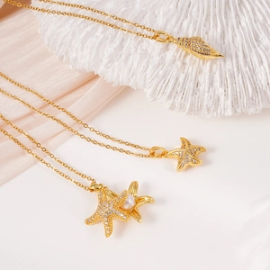 Golden starfish and conch pendants with zircon and pearl on stainless steel chains