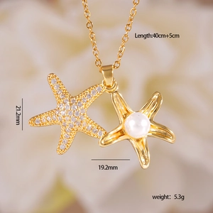 Gold stainless steel starfish necklace with sparkling crystals and pearl pendant