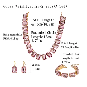 Pink rhinestone jewelry set including chunky necklace, bracelet and earrings in alloy