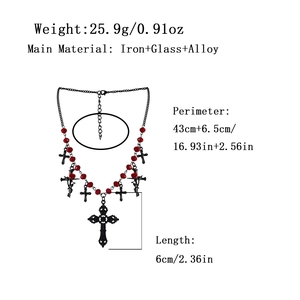 Gothic black cross necklace with red beads and hollow cross pendant on white background