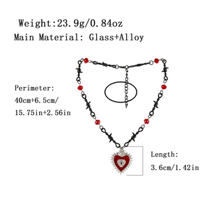 Gothic barbed wire necklace with silver rose and red heart evil eye glass pendant