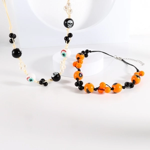 Collier d'Halloween fait main avec pendentifs tête de mort, œil et chauve-souris