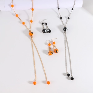 Halloween tassel jewelry set with skull and bat pendants in gold and silver finish