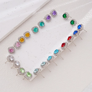 Elegant halo stud earrings set featuring multi-colored cubic zirconia in silver plating