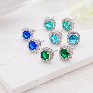 Square halo stud earrings set with vibrant round zircons in blue and green tones