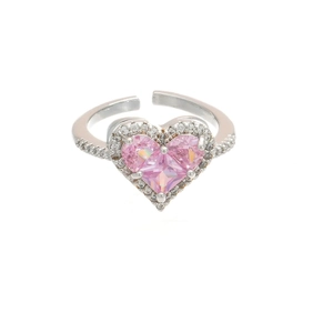 Anillo ajustable de plata con tres circonitas rosa en forma de corazón y cristales finos