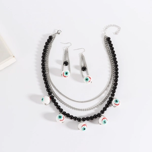 Halloween layered beaded necklace and earring set with realistic blue evil eye pendants