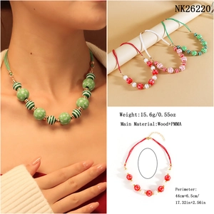 Detailed view of Christmas beaded necklace set with snowflake patterns and size specs