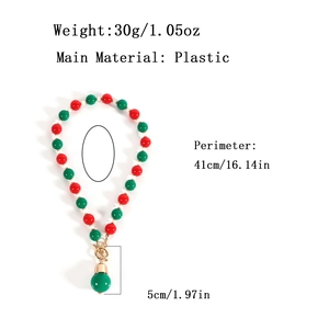 Collier de perles de Noël rouge, vert et blanc avec annotations de dimensions et de poids