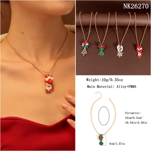Detailed view of Christmas pendant necklaces with dimensions and model wearing a Santa charm