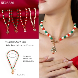 Detailed view of Christmas beaded necklaces with charms and size measurements