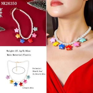 Detail showing colorful star pendants on pearl necklace with length measurements