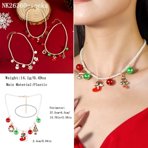 Detailed size specifications of a Christmas beaded necklace with Santa and sock charms