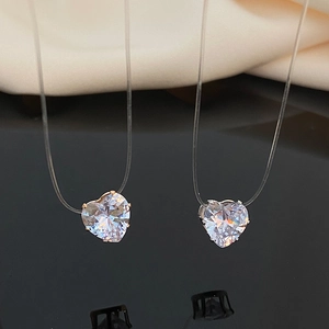 Minimalist clear heart zircon pendant necklace with invisible crystal line in rose gold and silver