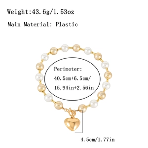 Collier punk en perles et billes dorées avec pendentif cœur et fermoir OT