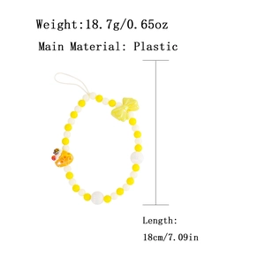 Handmade beaded phone strap with yellow strawberry cake charm and translucent bow