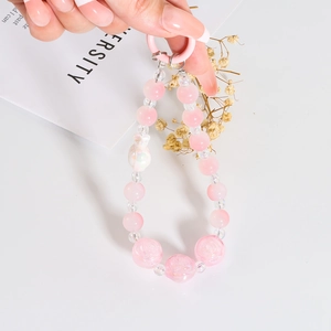 Pink beaded phone charm strap with rose shaped beads and cute aesthetic design