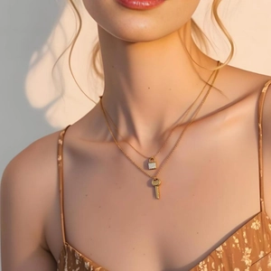 Minimalist double layered gold necklace with crystal lock and key pendants for women