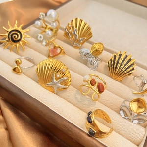 Böhmische Edelstahlringe in Gold und Silber mit Sonnenblumen- und Muscheldesigns