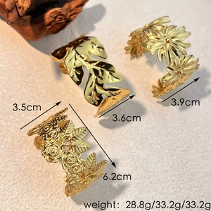 Elegant 18K gold-plated titanium steel floral cuff bracelets with leaf and daisy motifs