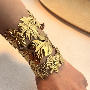 Chic 18K gold plated stainless steel cuff featuring floral and leaf design motifs