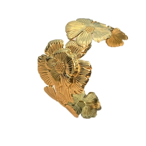 3D floral open cuff bangle in polished gold finish with detailed petal textures
