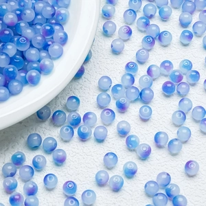 Macro shot of 6mm/8mm gradient blue and purple glass beads for DIY jewelry making