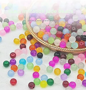 Macro shot of colorful 8mm faux jade glass beads showing translucent texture for DIY jewelry